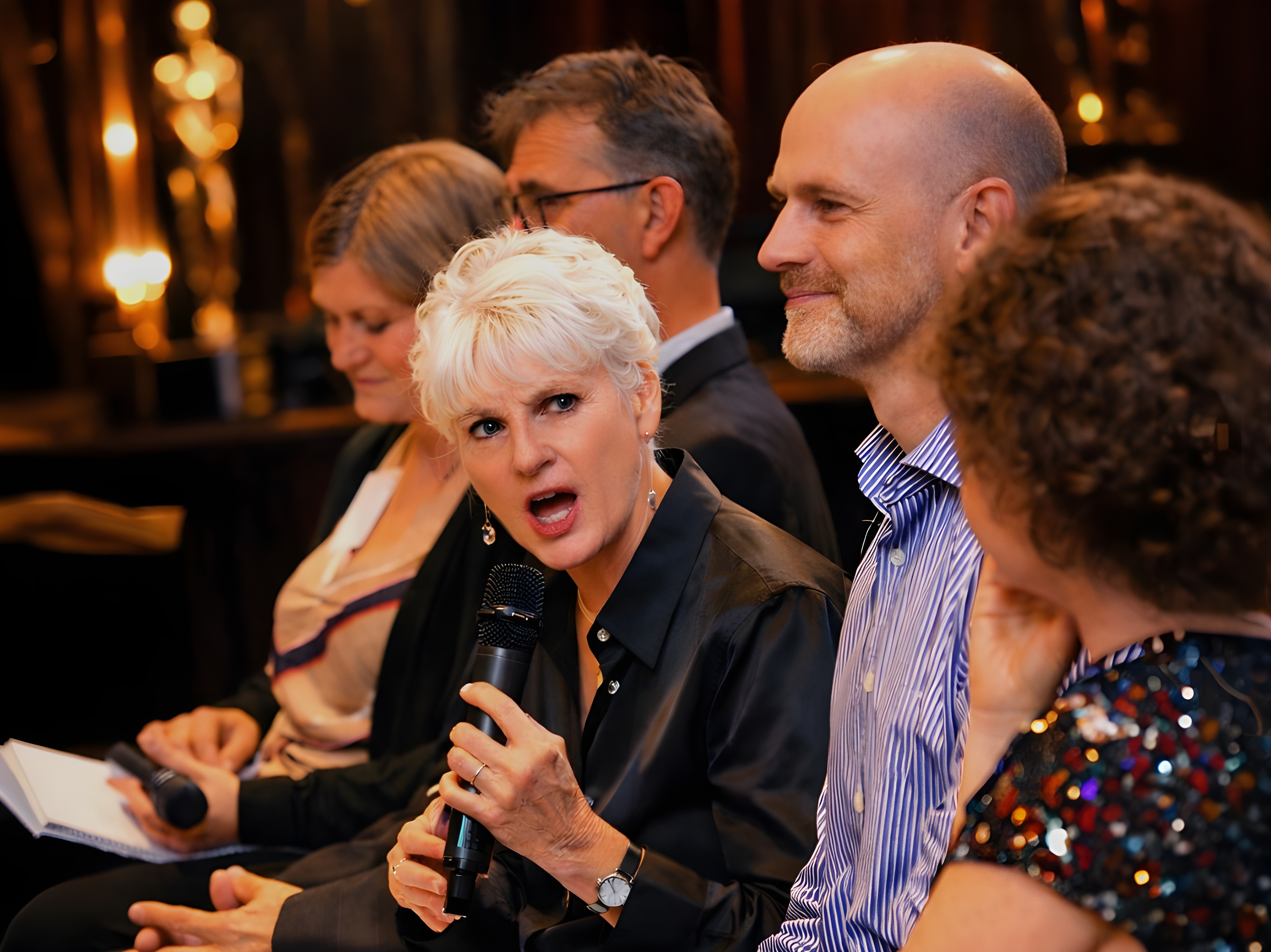 Education leaders at a formal gathering